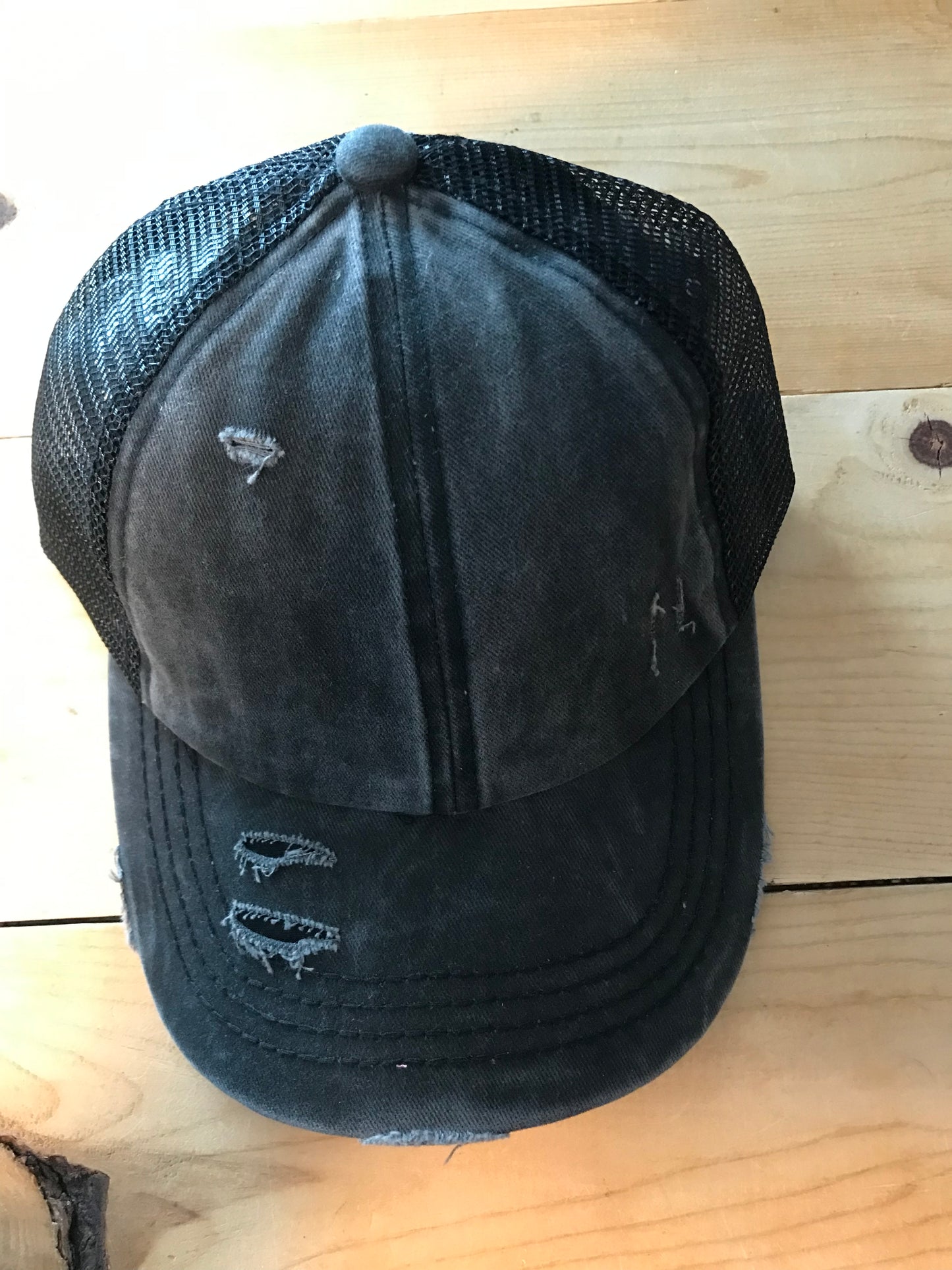 Black criss cross ponytail hat