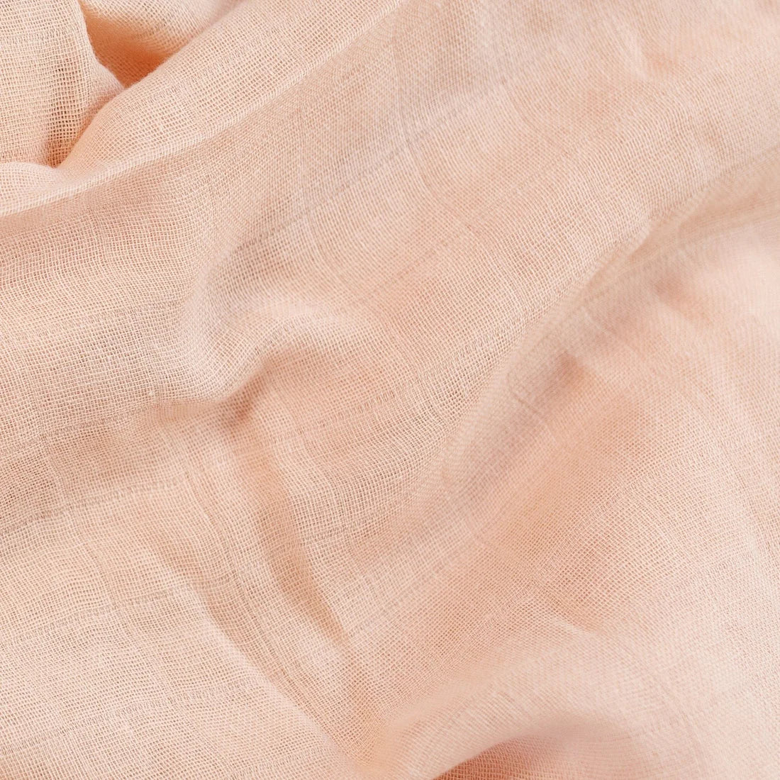 Toasted almond muslin swaddle