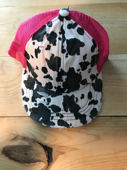 Hot pink cow criss cross ponytail hat